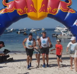 Terry and Ross at the finish line of the Rotto Swim Run