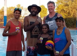 A group of people by the pool at Burringurrah