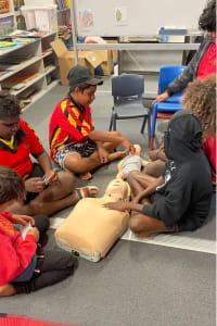 Jigalong school students learning CPR