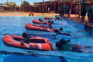 children participating in a boat race at the Kimberley Spirit Carnival