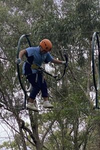 Yanchep student balancing on a high wire