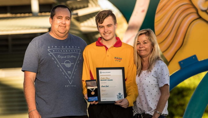 Kalgoorlie Lifeguard James Gent with his parents Paul and Alannah