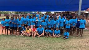 A group of Kimberley children with their teachers gathered as a group at the Spirit Carnival