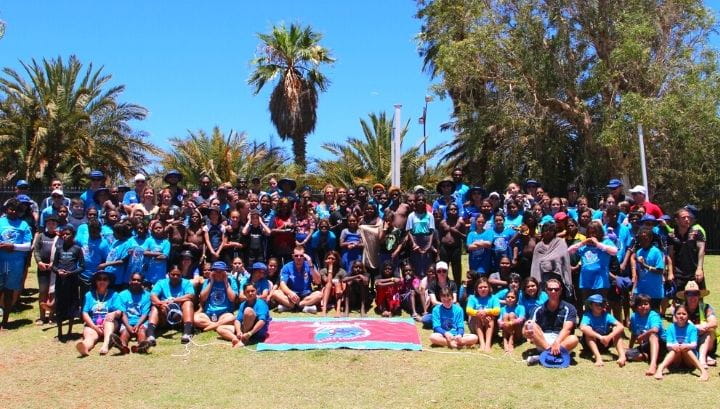 Attendees gathered on the grass at the Spirit Carnival