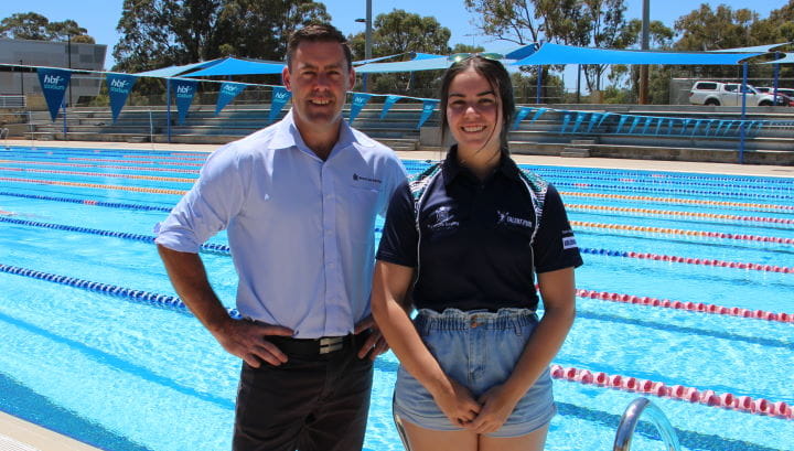 RLSSWA Senior Manager Workforce Solutions, Travis Doye, with Bree Bugeja by the pool at HBF Stadium