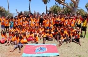 Group of children in orange shirts at Port Hedland pool