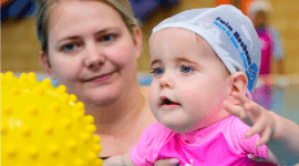 Swim mechanix infant with mother