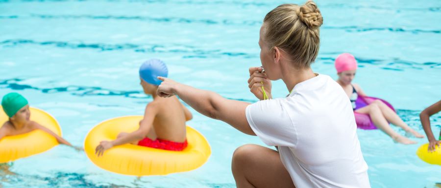 lifeguard supervising a pool