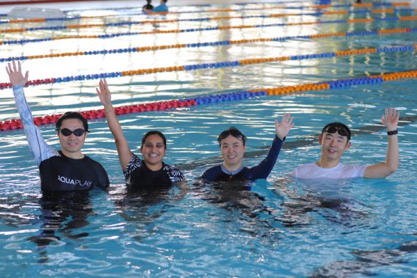 Skills to Teach participants at swim teacher course