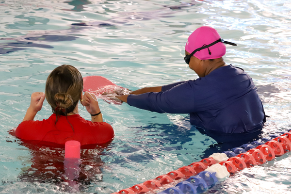multicultural women learning to swim
