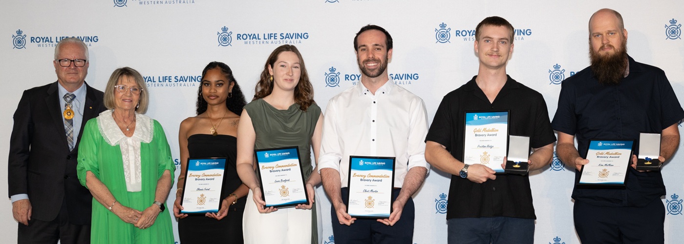 Aqualife Victoria Park staff holding their Bravery Awards