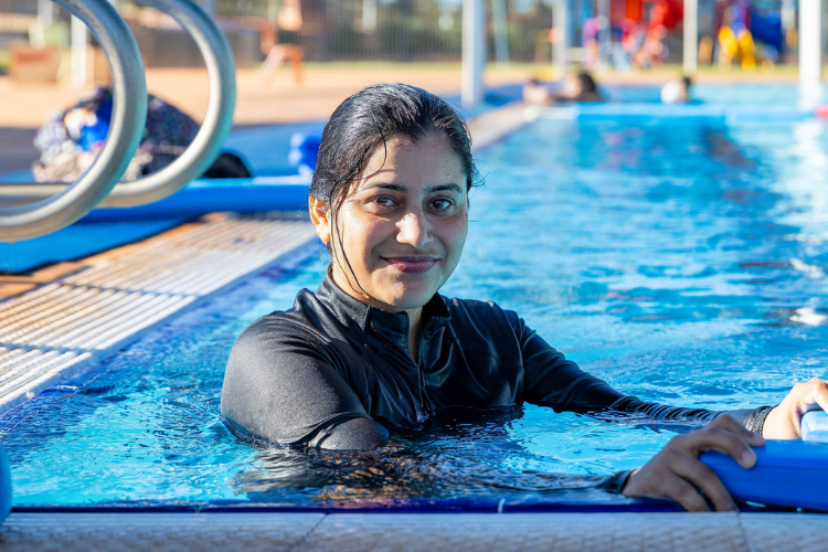 multicultural woman learning to swim at South Hedland