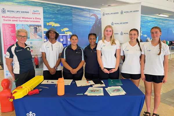 Karlgoorlie-Have-A-Go-Day-Additional-1_2024_600x400.png A group of people stand behind a table covered in Royal Life Saving WA educational materials