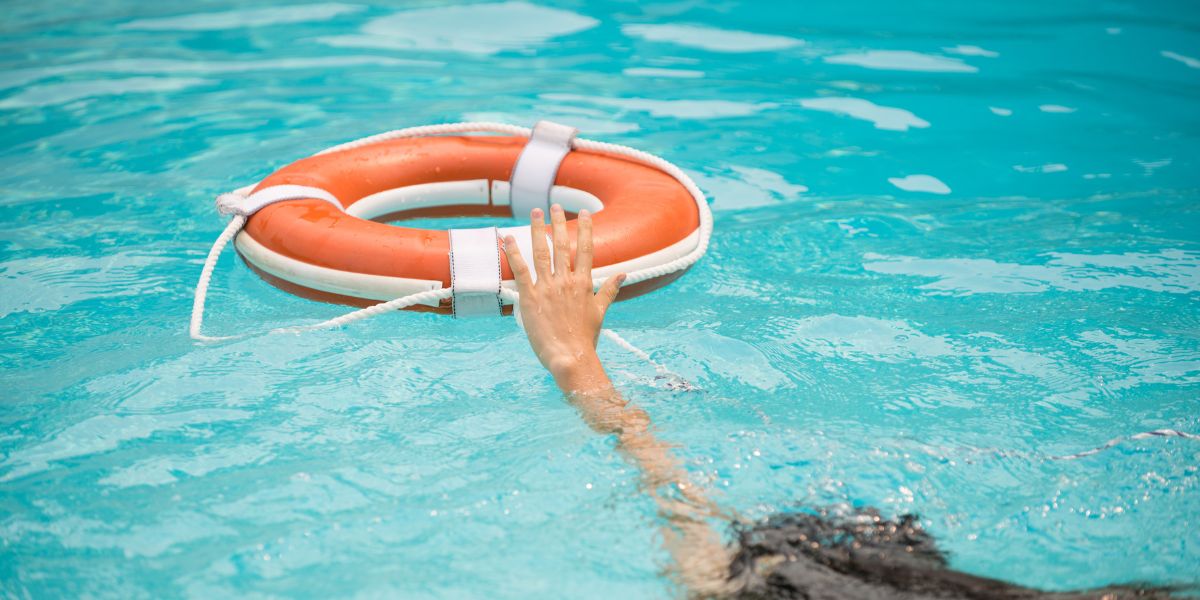 Hand reaching for lifebuoy