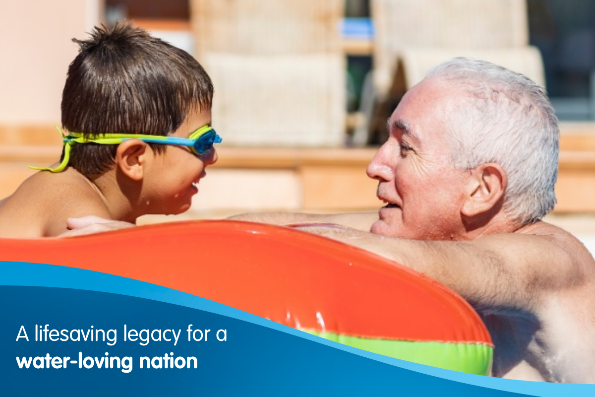 A young boy and his grandfather in the pool