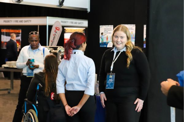 LIWA-Conference-additional_2025_600x400-4.jpg Royal Life Saving WA staff talking at trade booth