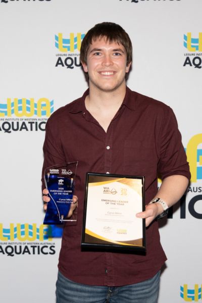 Cyrus Milne with Emerging Leader Award