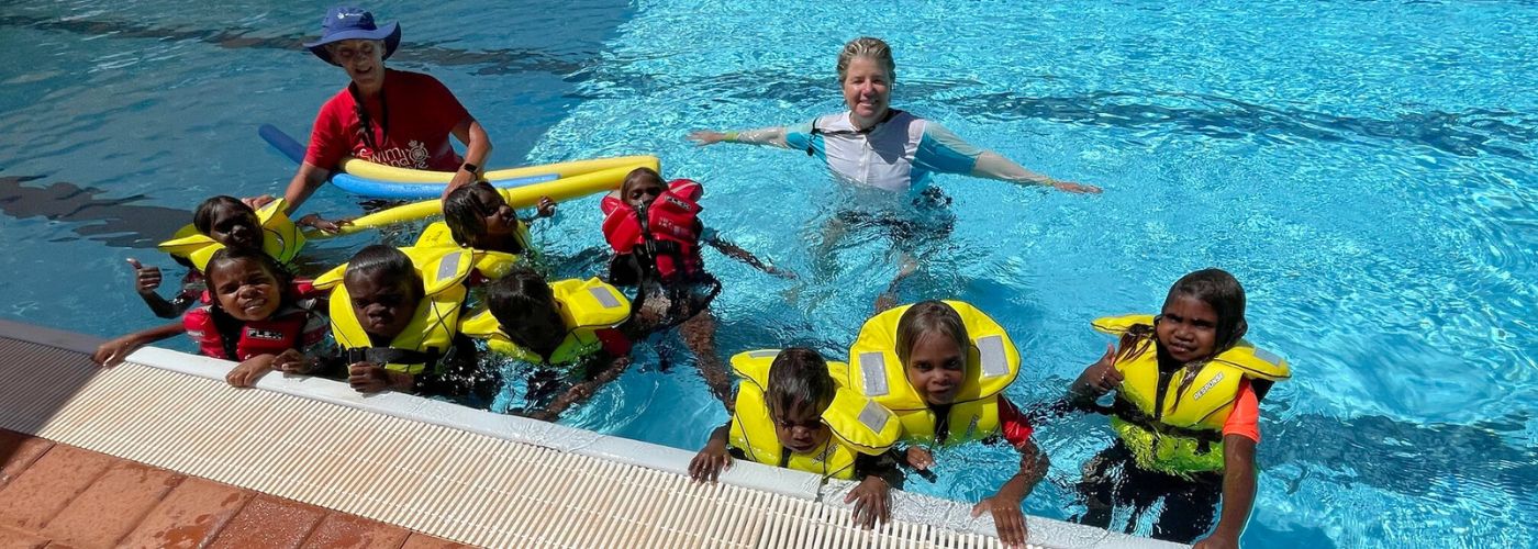 Jigalong children learning water safety skills at the local pool