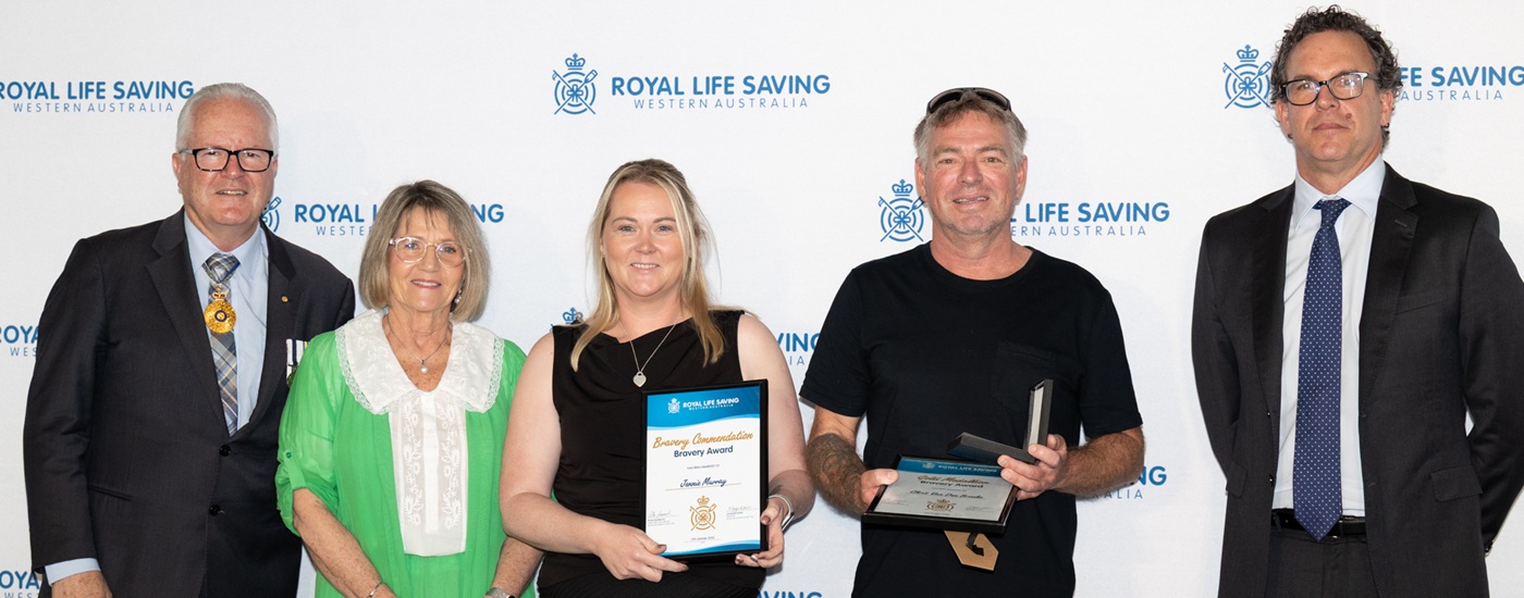 Chris van den Broeke and Jennie Murray receiving their Bravery Awards