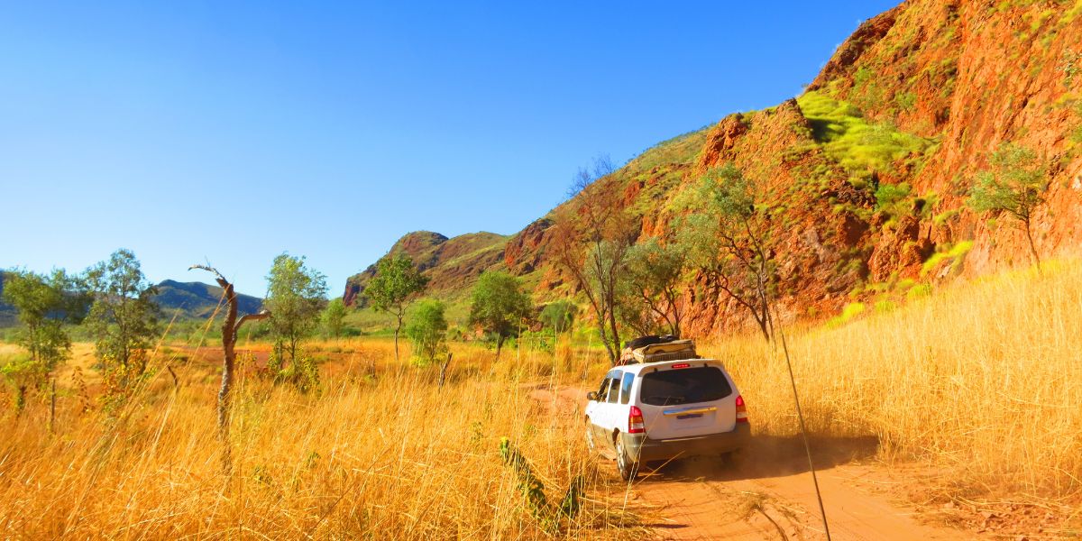 4WD car driving off-road in Australian outback