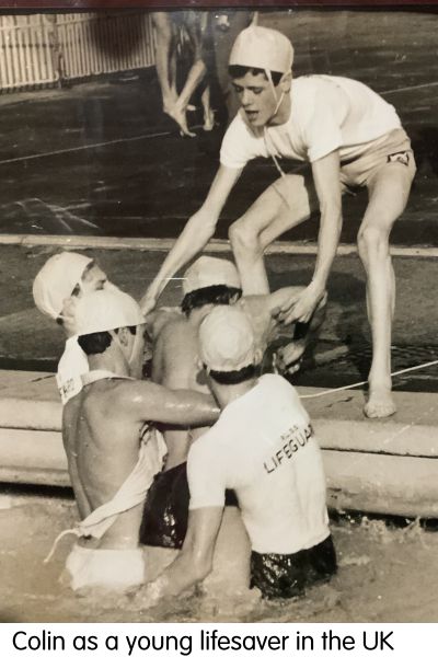 Black and white photograph of young Colin and colleagues practicing aquatic rescues in the UK