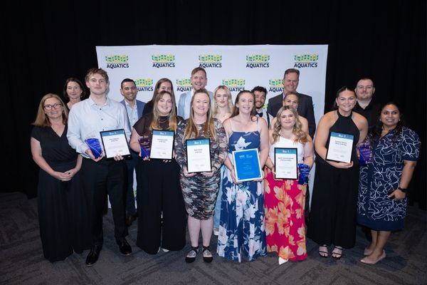 Group of individual award recipients holding certificates and trophies at the LIWA Aquatics WA Aquatic and Recreation Industry Awards.