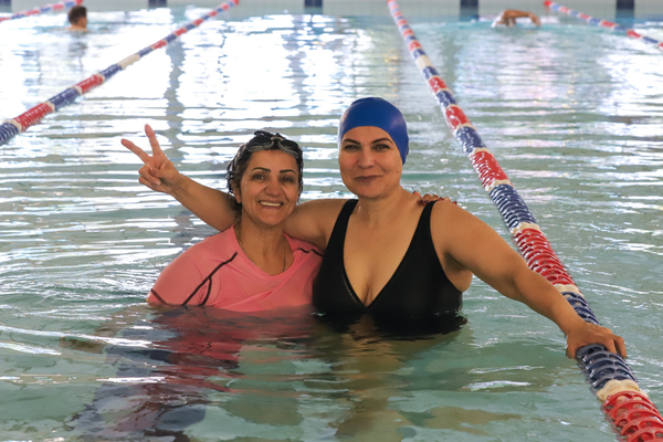 multicultural women learning to swim