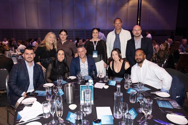 Royal Life Saving WA team members seated together at the LIWA Aquatics WA Aquatic and Recreation Industry Awards dinner.