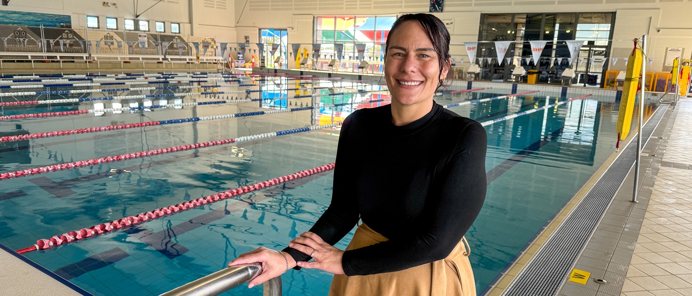 Leeanne Fasitua standing next to the indoor pool at Goldfields Oasis