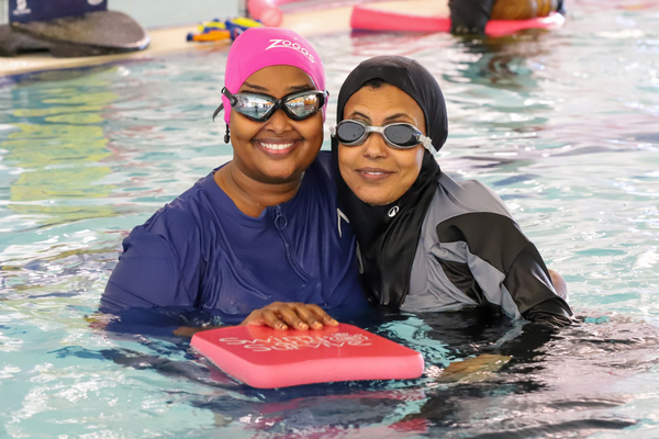 multicultural women learning to swim