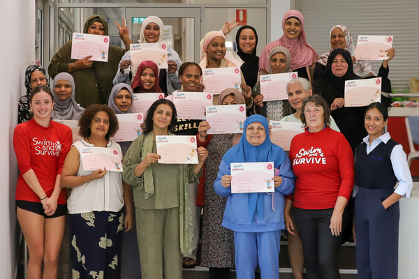 multicultural women learning to swim