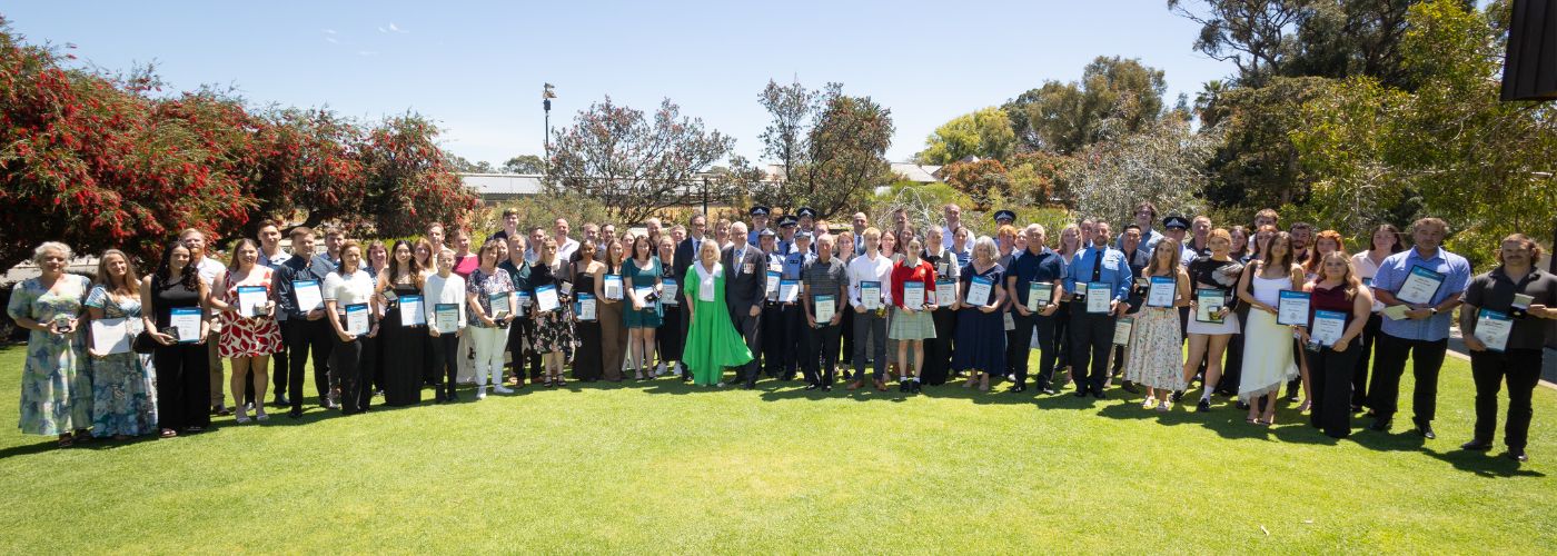 Group photo from 2025 Bravery Awards in front of State Reception Hall